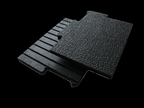 Interlocking stall mat edge and textured surface detail